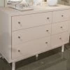 Signature Design By Ashley® Wistenpine Blush Dresser -Furniture Store 1c90ce30 cc18 4700 98c5 9a044ad960d0
