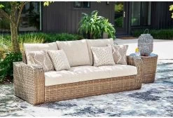 Signature Design By Ashley® Sandy Bloom Beige Outdoor Sofa With Cushion -Furniture Store 2b949ab8 4e92 443b 820b 7a5517644b32
