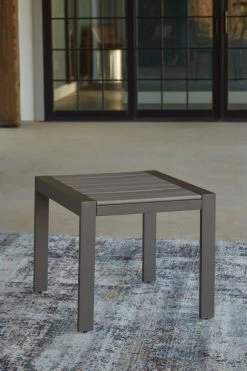 Signature Design By Ashley® Tropicava Taupe Outdoor End Table -Furniture Store 2d9fb9b6 0ec9 48d3 abf4 b4f6e6b4bbca