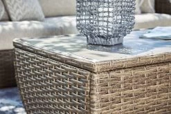 Signature Design By Ashley® Sandy Bloom Beige Outdoor Coffee Table -Furniture Store 51e6c5c0 c359 4c2a 9f77 90bad4c071f6