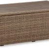 Signature Design By Ashley® Sandy Bloom Beige Outdoor Coffee Table