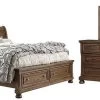 Signature Design By Ashley® 3pc Flynnter Medium Brown King Storage Bedroom Set P61386394 1 Signature Design By Ashley® 3pc Flynnter Medium Brown King Storage Bedroom Set P61386394 -Furniture Store 802baa74 9c98 4e29 bf76 df7ff4292a0a
