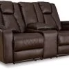 Signature Design By Ashley® Mancin Chocolate Reclining Loveseat With Console -Furniture Store 8976672a 2893 4043 88ba a5296ae559dc