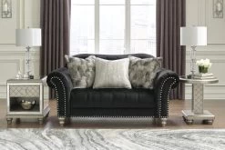 Signature Design By Ashley® Harriotte Black Loveseat -Furniture Store 9d9707e7 2ddd 4c63 86b7 2d9c530b1f06