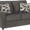 Signature Design By Ashley® Cascilla Slate Loveseat -Furniture Store b26c6441 344d 41e8 ade9 75debe2f5c2e