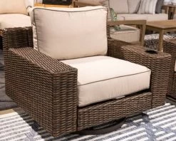 Signature Design By Ashley® Coastline Bay Brown Swivel Lounge Chair