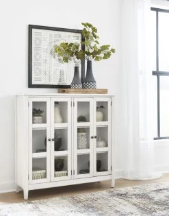 Signature Design By Ashley® Kanwyn Whitewash Accent Cabinet -Furniture Store cc27e61e 4c18 4723 9615 e1e68edb7e3e