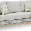 Signature Design By Ashley® Seton Creek Gray Outdoor Sofa With Cushion -Furniture Store ce2dacd4 a1d9 41a3 b197 eda428319b18