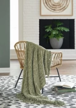 Signature Design By Ashley® Tamish Green Throw Blanket -Furniture Store dcfad861 42f3 4170 be34 26989cff68f1