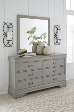Signature Design By Ashley® Kordasky Gray Dresser And Mirror -Furniture Store e91ddff4 1e02 4933 ad32 9e7335c68339