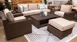 Signature Design By Ashley® Coastline Bay Brown Swivel Lounge Chair -Furniture Store f1591c1e 3874 4a1d 9782 c967a9f1cc59