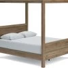 Signature Design By Ashley® Aprilyn Honey Queen Canopy Bed 1 Signature Design By Ashley® Aprilyn Honey Queen Canopy Bed -Furniture Store fa5f5a60 c984 4f4e 93d9 06e3e5a1a801