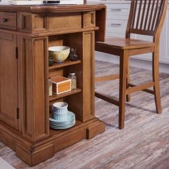 Homestyles® Americana 3-Piece Brown Kitchen Island Set -Furniture Store fd3a9c48 bc3c 4dee 9b64 449c2f02c8eb